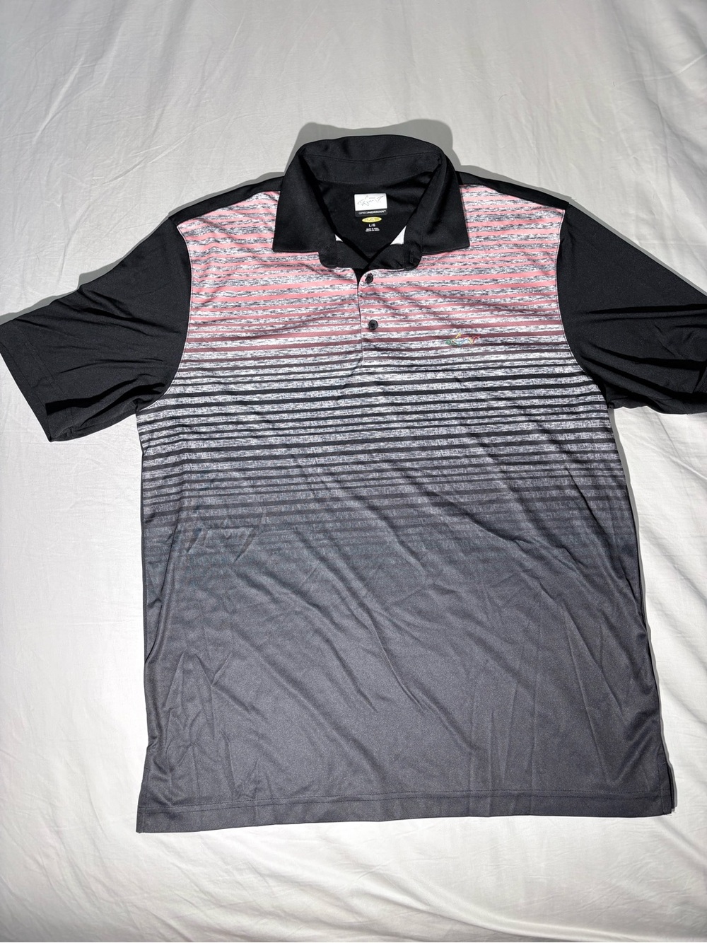 Greg Norman Collection Black Polo with Pink-to-Gray Gradient